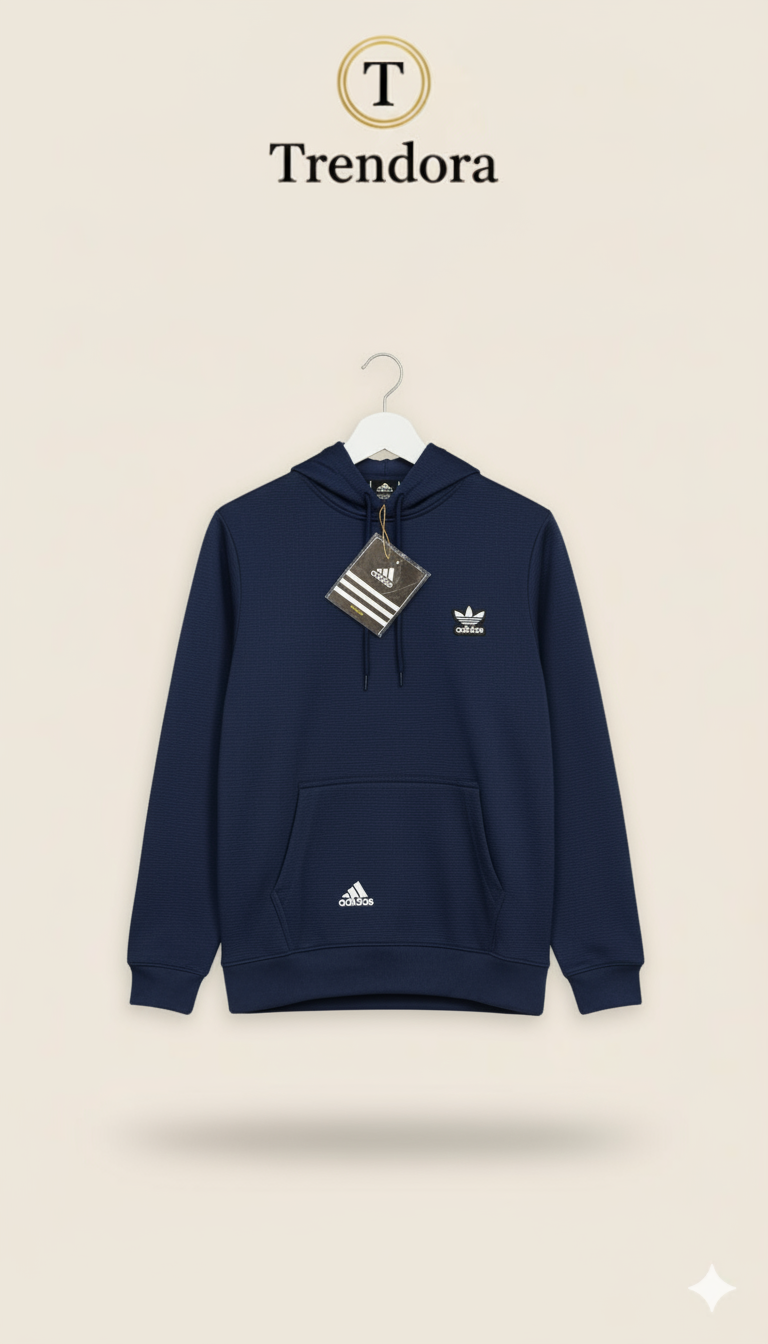 Navy hoodie with Adidas logo on a beige background