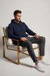 Navy Blue Hoodie - Seated view