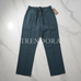 Dark Teal Trousers - Flat lay